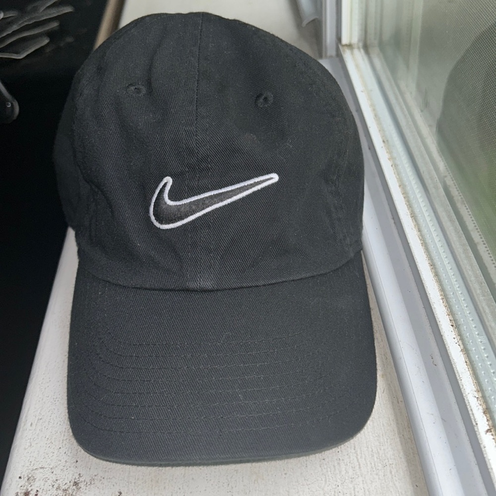 Nike hat worn twice. One size fits all. Comfortable fit. 1/3 of original price